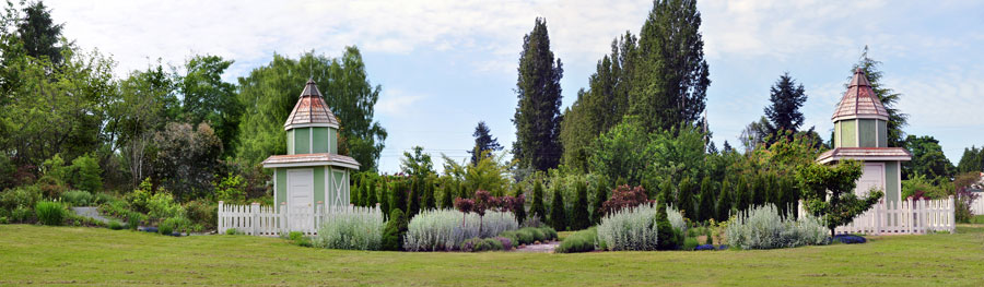 Panoramic view of the "Twin Towers", the well house and the storage shed